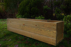 Wooden Planter Boxes in a brown wood stain finish