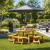 Rustic Wooden Picnic Dining Set with Round Table and 4 Benches - view 1