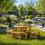 Rustic Wooden Picnic Dining Set with Round Table and 4 Benches - view 3