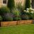 Wooden Garden Border Lawn Edging Log Style with Stakes 120cm - view 1